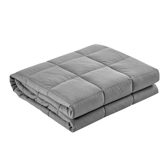 Weighted blanket in gray with quilted channels, folded neatly