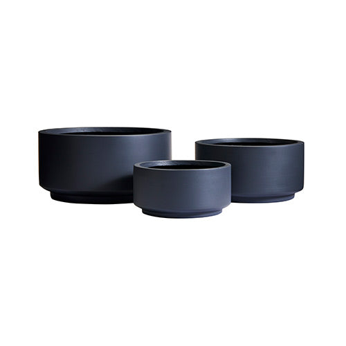 Round plant pot set with three dark charcoal-gray planters on a white background