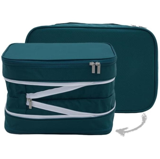 Green expandable clothing storage bag with double zippers and white trim, open front