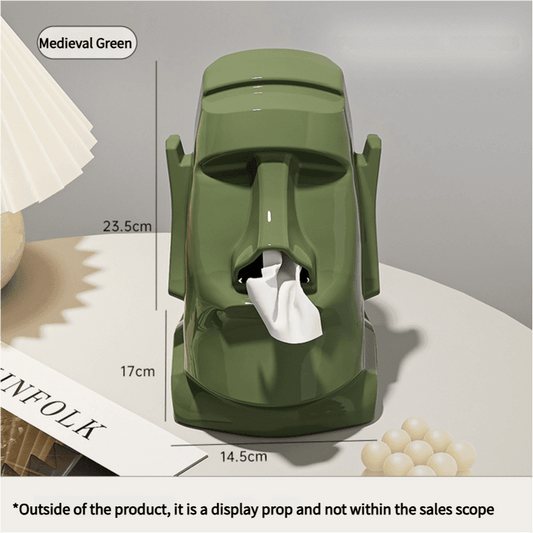 Green headphone stand and tissue box with tissue protruding from front