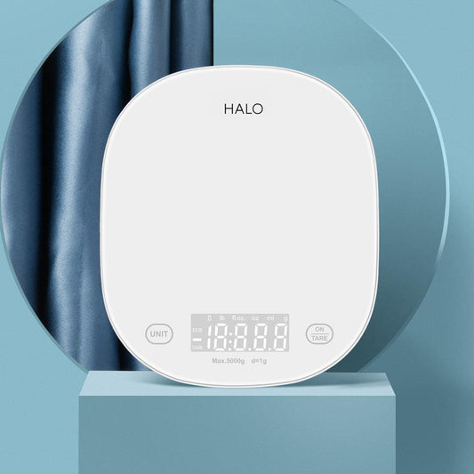 HALO app kitchen scale, white round body with LCD screen and tare/units buttons