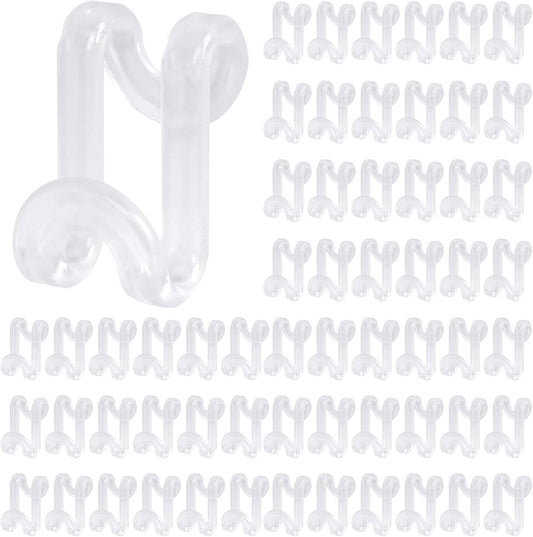 Set of clear plastic hanger connector hooks, stacked and ready to use