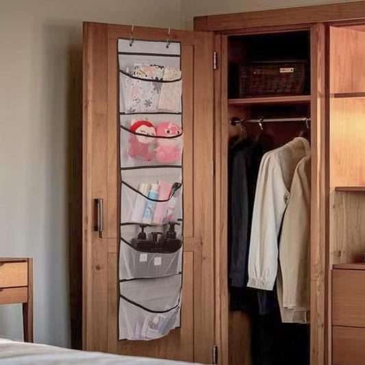 Door-hanging storage organizer with five fabric pockets, black frame and mesh compartments.