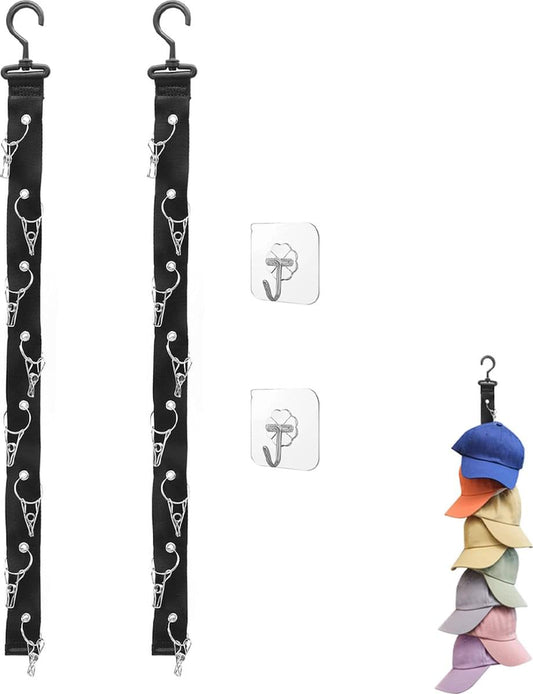 Black wall hat hook strip with metal hooks and clip loops, holding baseball caps