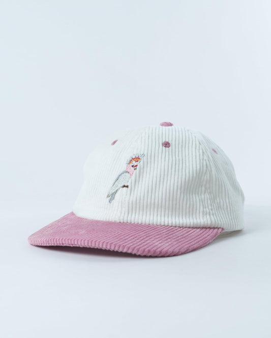 White ribbed beanie with pink brim and embroidered cockatoo on front
