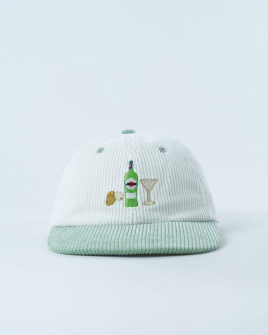 White ribbed beanie with green brim and embroidered cocktail martini graphic