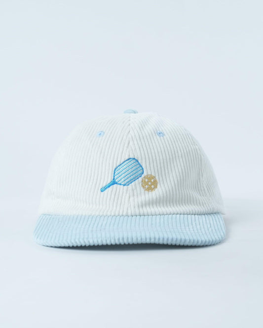 White ribbed knit baseball cap with blue paddle and yellow ball embroidery