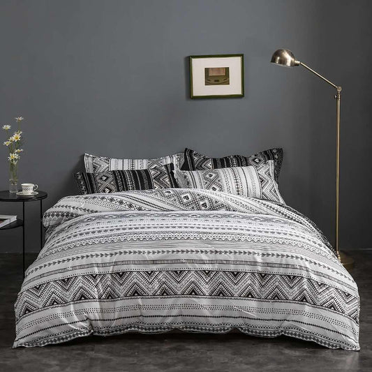 Reversible queen duvet quilt cover set with black-and-white geometric stripe pattern