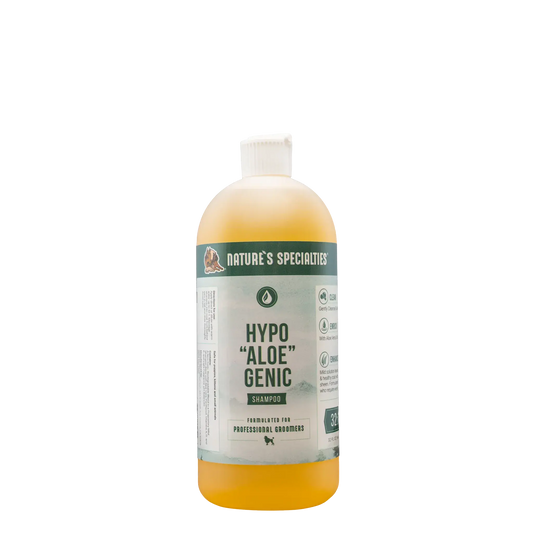 Aloe genic shampoo bottle, white-and-orange with flip cap, Nature's Specialties label.