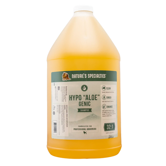Aloe genic shampoo bottle, large white-and-orange bottle with green label and flip cap.