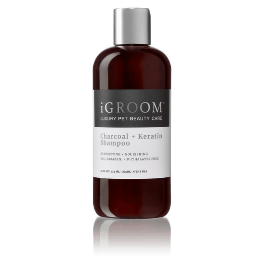 iGROOM Charcoal + Keratin shampoo bottle, dark amber with silver cap