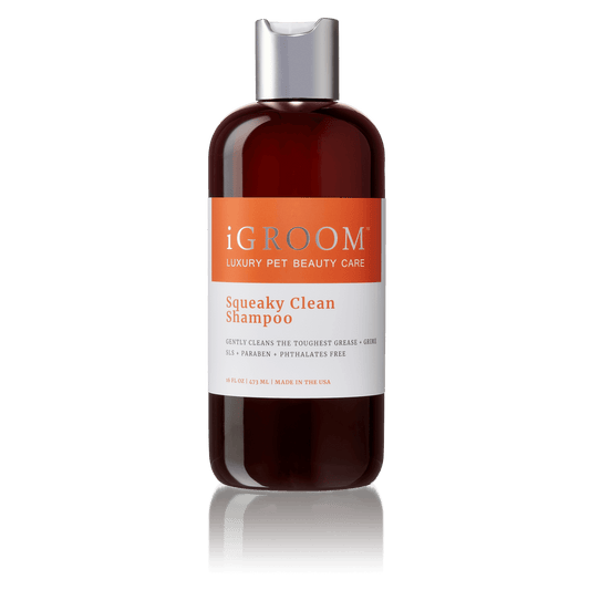 iGROOM shampoo bottle with dark amber body, white label, and silver cap