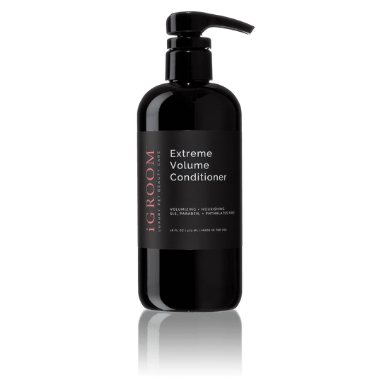 Black conditioner bottle with pump, label reading Extreme Volume Conditioner
