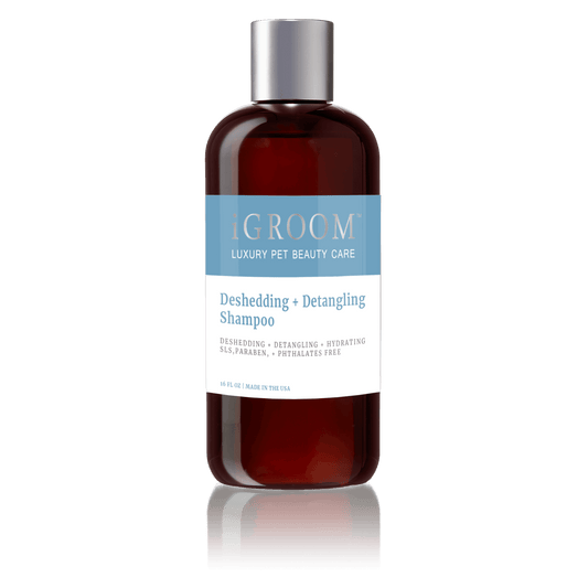 iGROOM Deshedding + Detangling Shampoo bottle, dark amber with silver cap.
