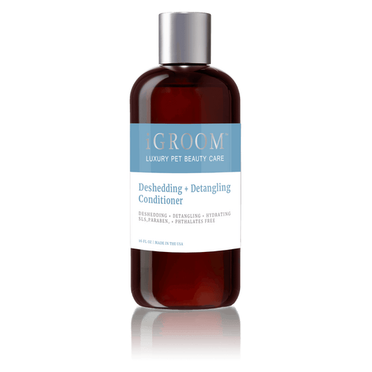 iGroom Deshedding + Detangling Conditioner bottle with silver cap