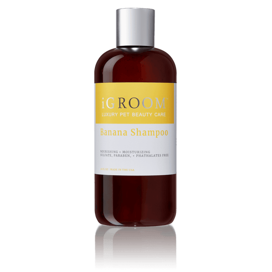 Amber shampoo bottle with silver cap and Banana Shampoo label (iGROOM)