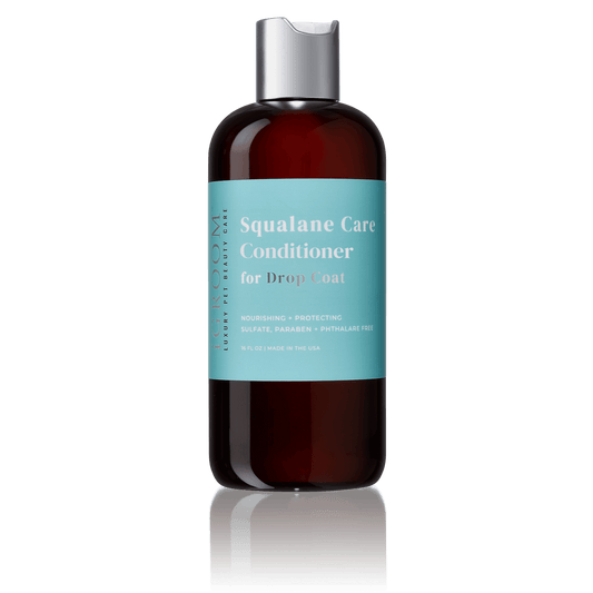 iGroom Squalane Care Conditioner for Drop Coat amber bottle with teal label