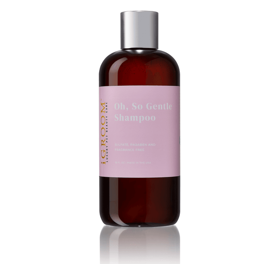 iGROOM Oh, So Gentle Shampoo bottle with silver cap, amber glass and pink label