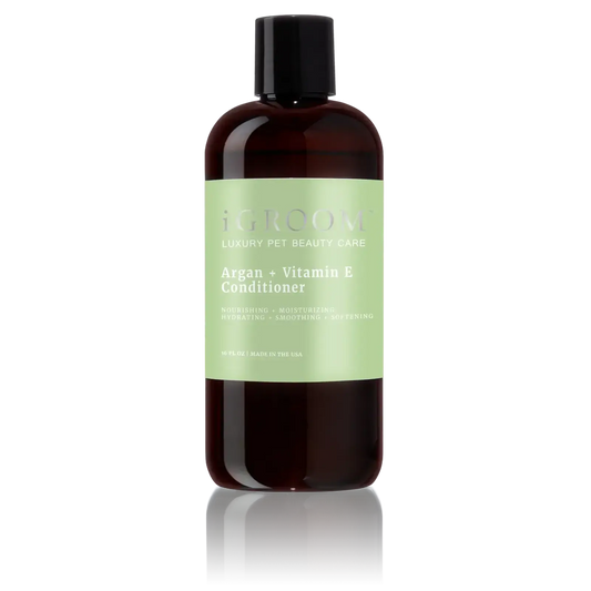 iGroom Argan + Vitamin E moisturizing conditioner, dark amber bottle with black cap