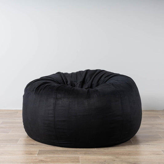 Black bean bag chair with rounded cushion and gathered, creased upholstery