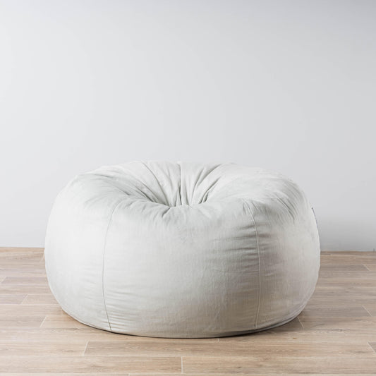 Silver grey faux-fur bean bag with rounded, tufted top