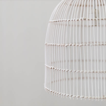Whitewash rattan cane pendant light side view with horizontal band and scalloped bottom