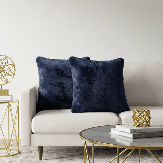 Navy plush fur cushion cover set, soft cloud-like texture on sofa