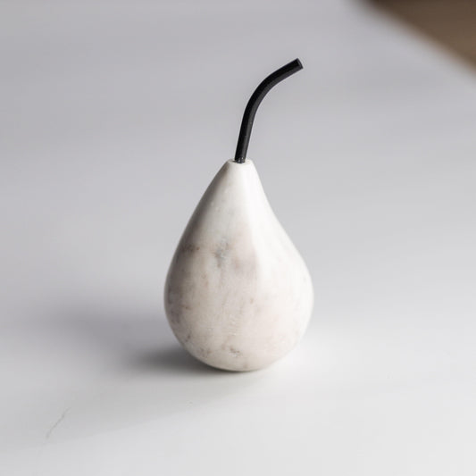 White marble pear-shaped burner/diffuser with black curved wick