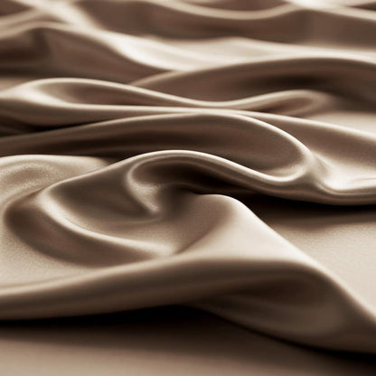 Champagne satin sheet set with smooth draped folds