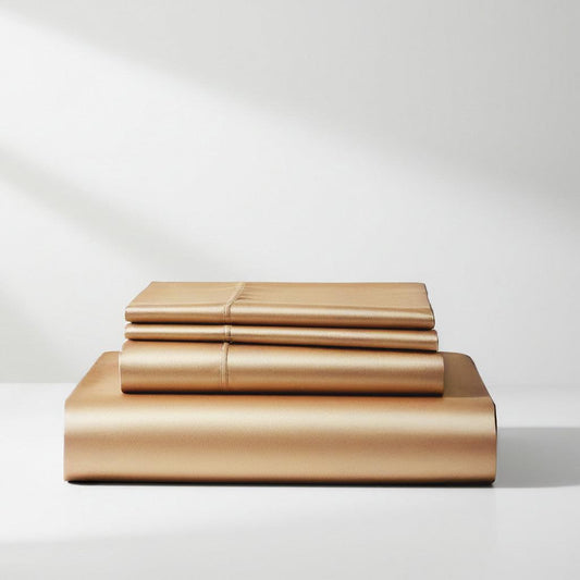 Veuve Gold satin sheet set with folded sheets in metallic gold tone