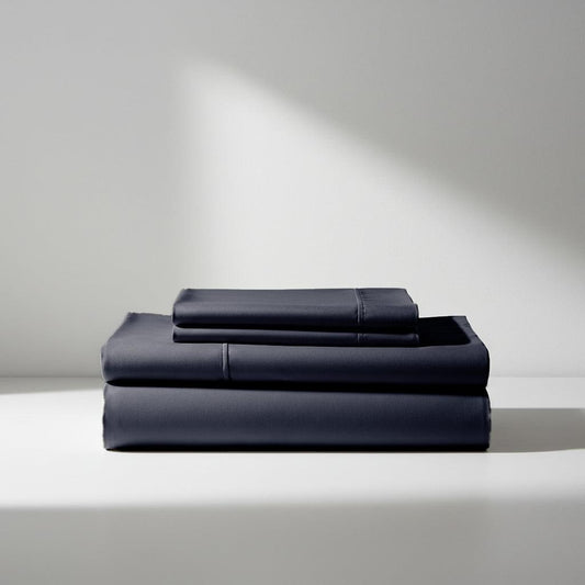 Charcoal bamboo sheet set, neatly folded stack of sheets and fitted sheet