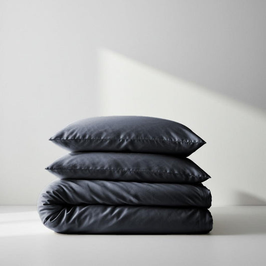 Charcoal silky quilt cover with matching pillowcases, neat stitched edges