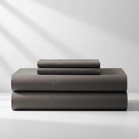 Charcoal grey sheet set with flat sheet and fitted sheet, neatly folded