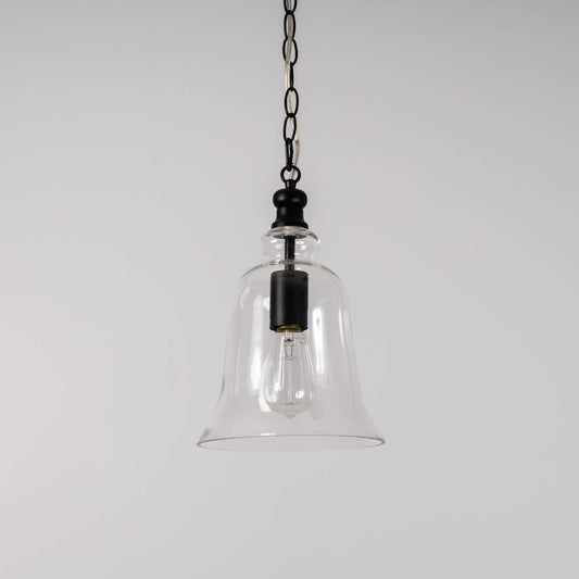 Black bell-shape glass pendant light with metal chain and lit socket inside clear glass shade