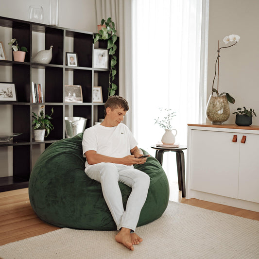 Emerald green fabric bean bag chair, large rounded seat