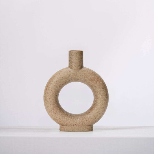 Beige ceramic vase with tall neck and round ring opening, front view