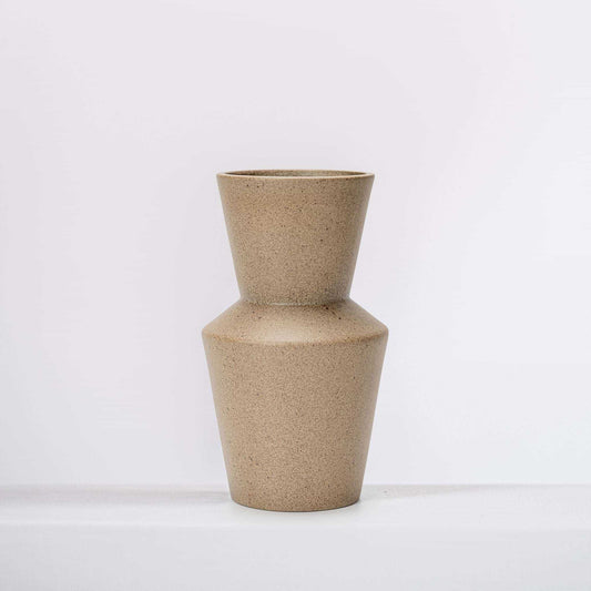 Speckled clay ceramic two-tier vase with tapered neck and rounded base.
