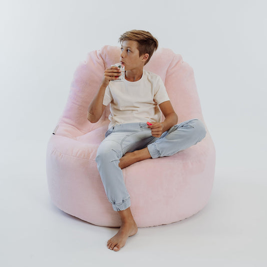 Soft pink plush fur bean bag chair cover with wide curved seat and back