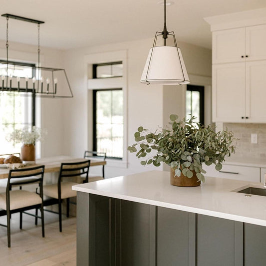 Single white fabric pendant light with black canopy and metal frame