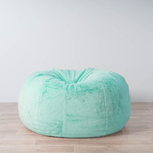 Turquoise plush fur bean bag with rounded cloud shape and stitched seams