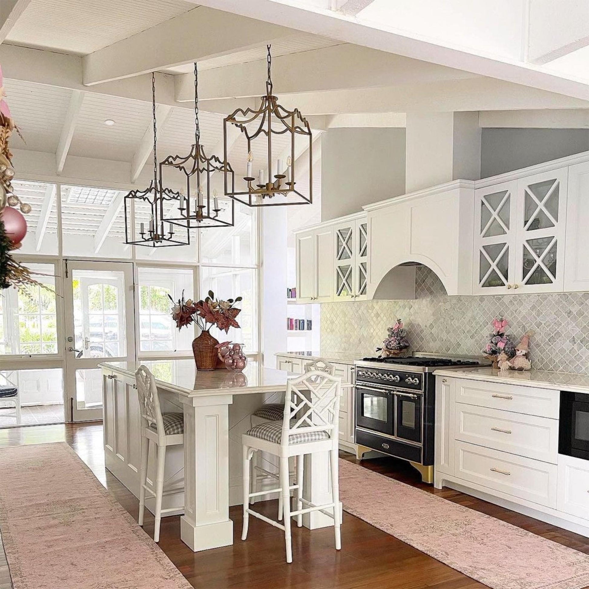Brushed champagne box frame lantern pendant light group in a kitchen