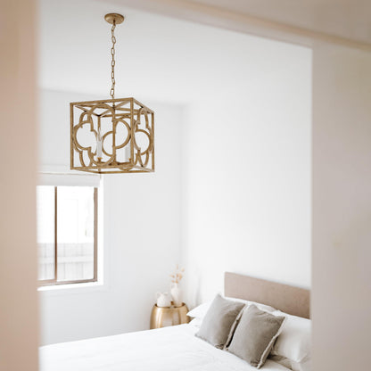 Gold detailed box frame lantern pendant light hanging from ceiling chain