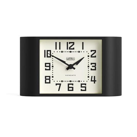 Black mantel clock with rectangular cream face and bold number markers
