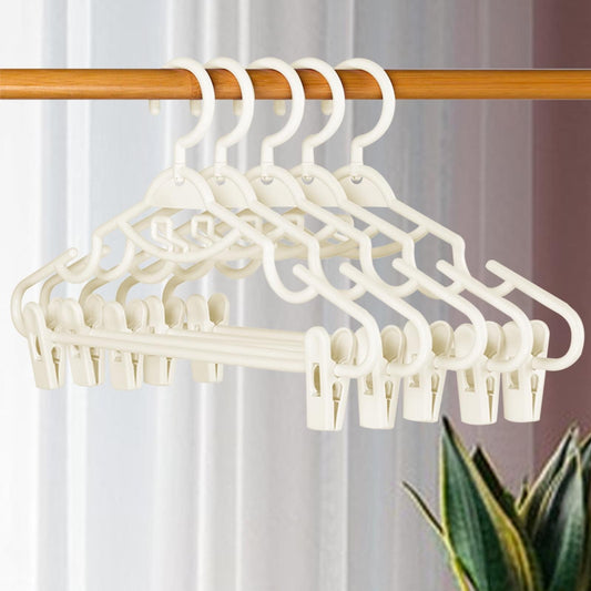 White plastic pants hanger with clips and grid bar design