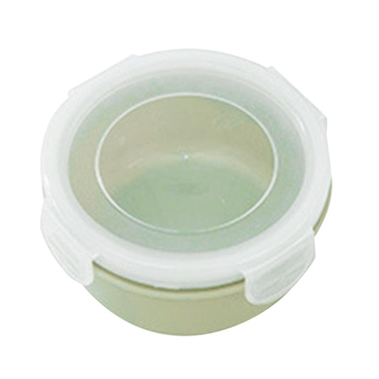Small round plastic bento storage container with clear snap lid, pale green