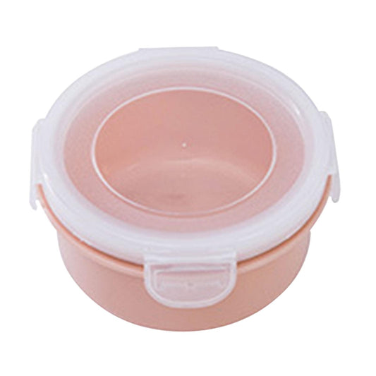 Small plastic bento box with pink body and clear snap-on lid