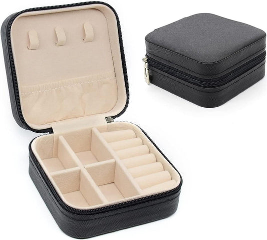 Small black jewelry organizer case with zipper, open compartments for rings and earrings
