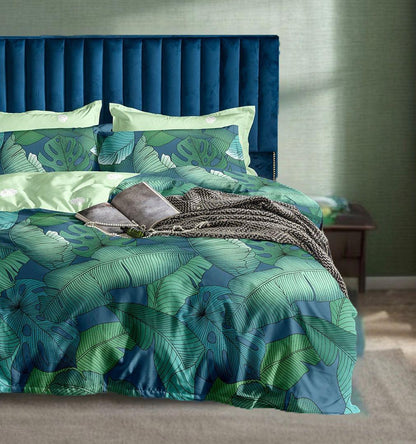 King-size quilt cover set detail: green and blue leaf print with two pillowcases
