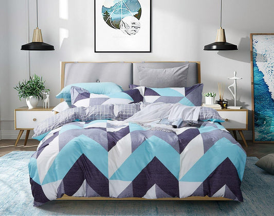 Geometric duvet quilt cover set in teal, navy, and white with matching pillows