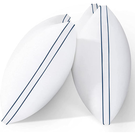 Hotel twin pillows with blue piping, white curved profile showing stitched edges